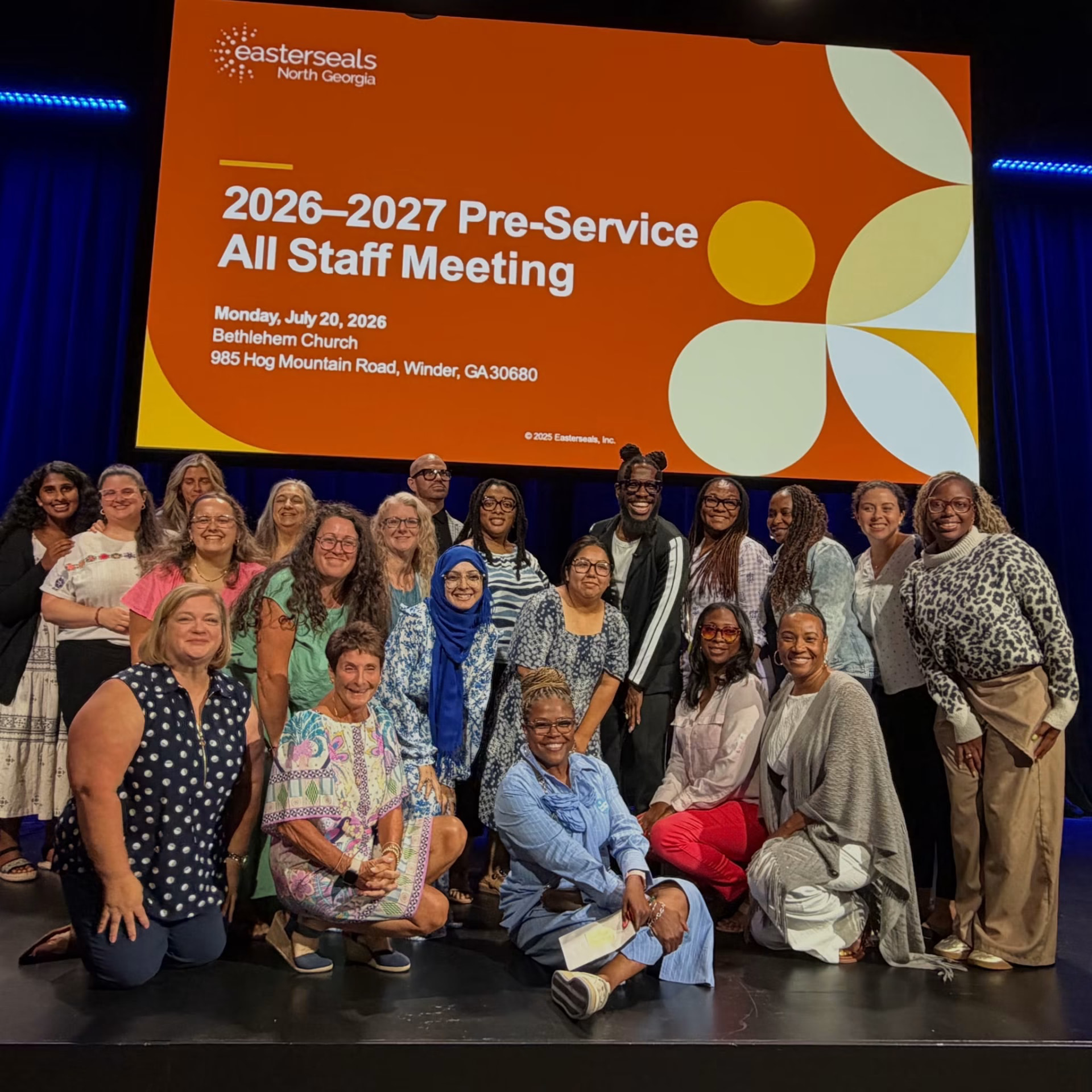 Gasby with the Easterseals North Georgia staff at the 2026-2027 pre-service all staff meeting